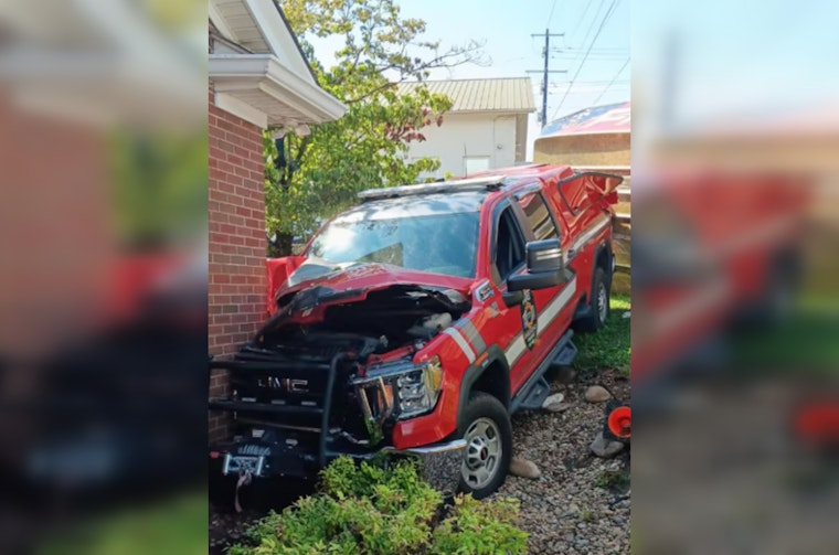 Dandridge Firefighter Suffers Medical Incident, Command Truck Tows Boat Into Building