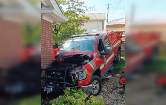 Dandridge Firefighter Suffers Medical Incident, Command Truck Tows Boat Into Building