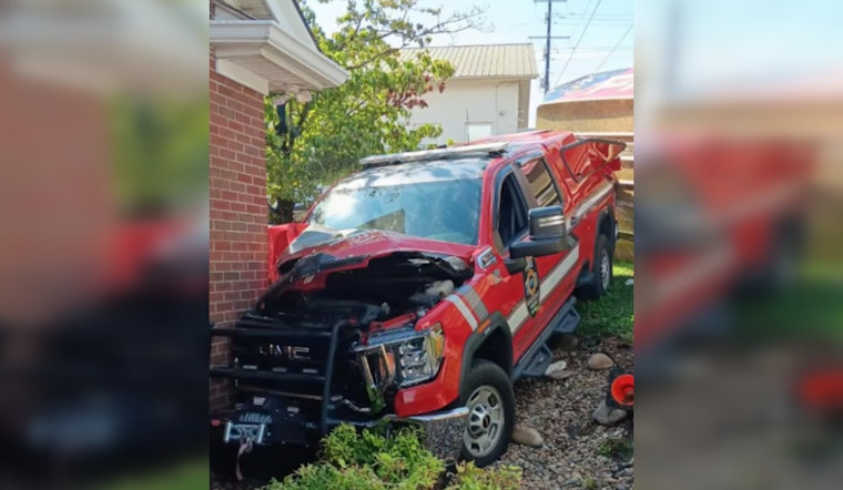 Dandridge Firefighter Suffers Medical Incident, Command Truck Tows Boat Into Building