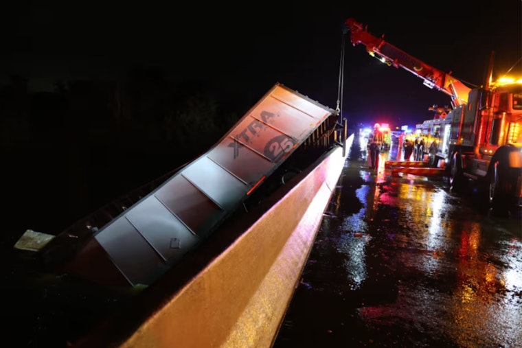 Semi-Truck Driver Perishes as Vehicle Plunges into Tampa Bypass Canal Following Early Morning Accident