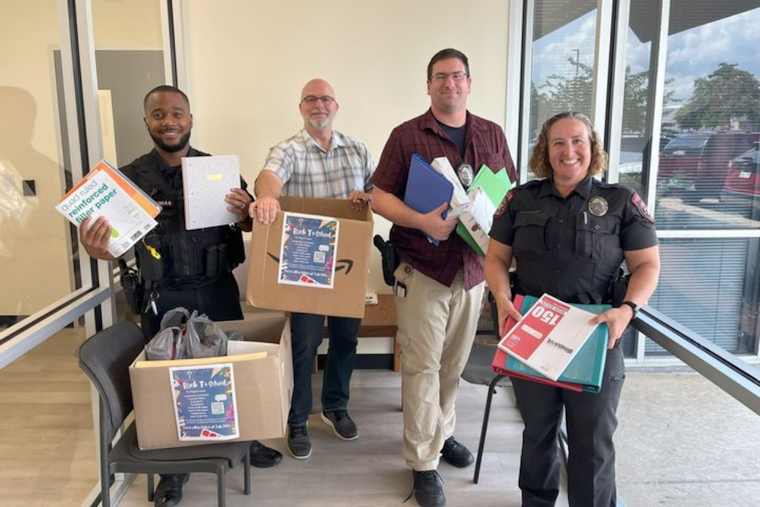 Lewisville Police Department Donates Essential School Supplies to Denton County Friends of the Family
