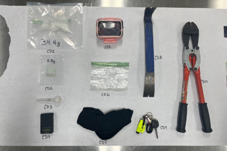 Police Uncover Stolen Vehicle and Drugs After Traffic Stop of Masked Driver with Felony Warrant