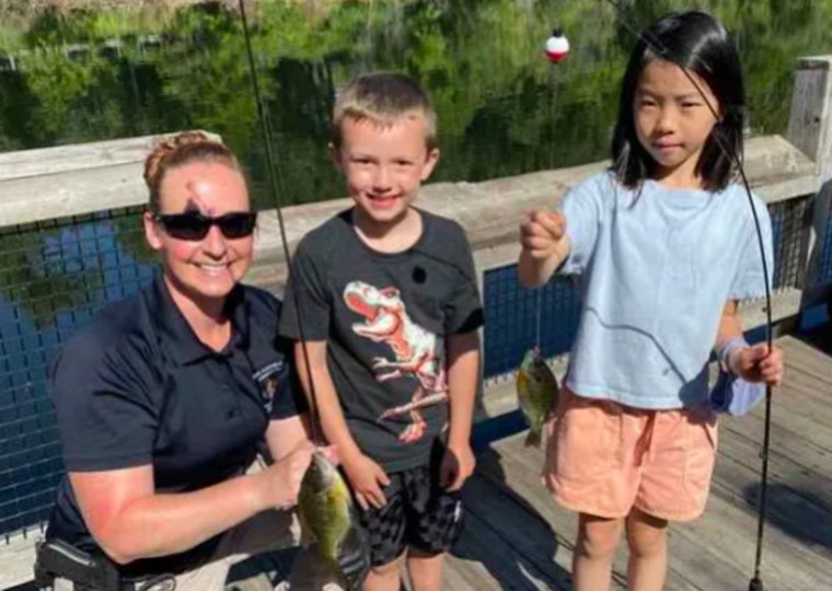 St. Louis Park Police Host "Fishing with a Cop" to Bond with Community Youth at Wolfe Park