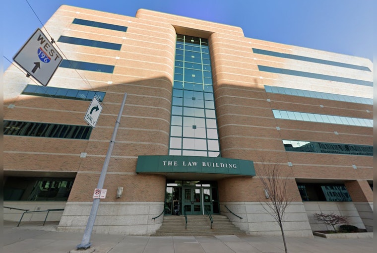 Suspect Faces Charges for Gun Possession During Kalamazoo Marathon, Off-Duty Detective Hailed as Hero