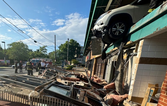 SUV Dangles Over Edge After Crashing Through Whole Foods Garage Wall in Northwest D.C.