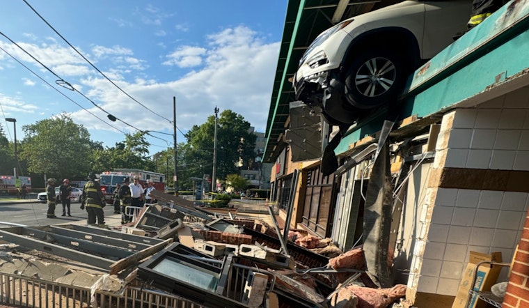 SUV Dangles Over Edge After Crashing Through Whole Foods Garage Wall in Northwest D.C.