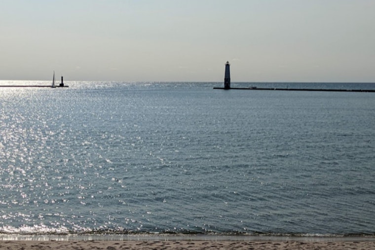 Tragic Boating Accident on Lake Michigan Claims Life of Midland Senior, Brave Rescue Effort Saves Companion Near Frankfort