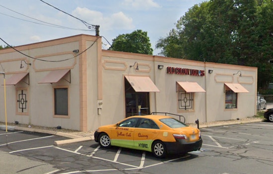 Adult and Juvenile Hospitalized After Car Smashes Into Quincy Liquor Store, Prompting Investigation