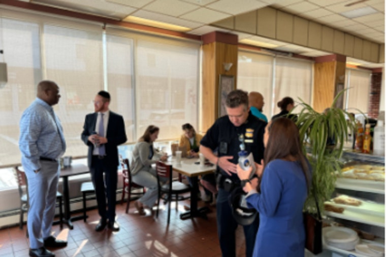 Boston Police and Community Members Strengthen Bonds Over Coffee in Brighton