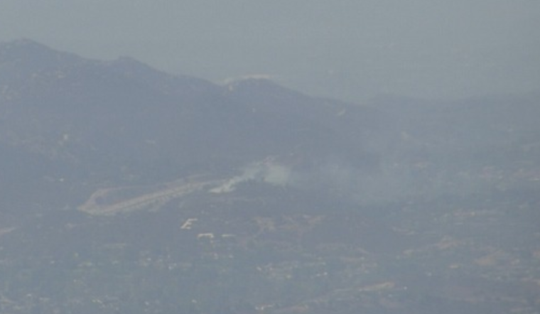 CAL FIRE and Deer Springs Fire Respond to Mulch Pile Blaze Near I-15 in San Diego County