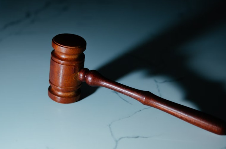 Former Houston Soccer Player Charged with Assault and Bond Violation Following Daycare Incident