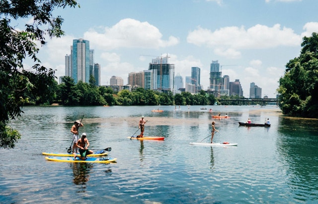 Stand-Up Paddleboarders Embark on 21-Mile Lake Austin Journey to Raise $1.4M for Cancer Support at 15th Annual Dam That Cancer Event