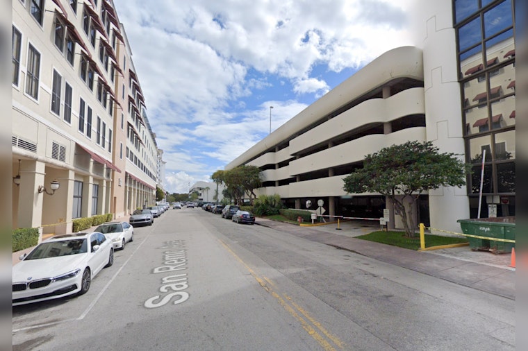 SUV Dangles on Edge of Parking Garage in Coral Gables, Driver Rescued