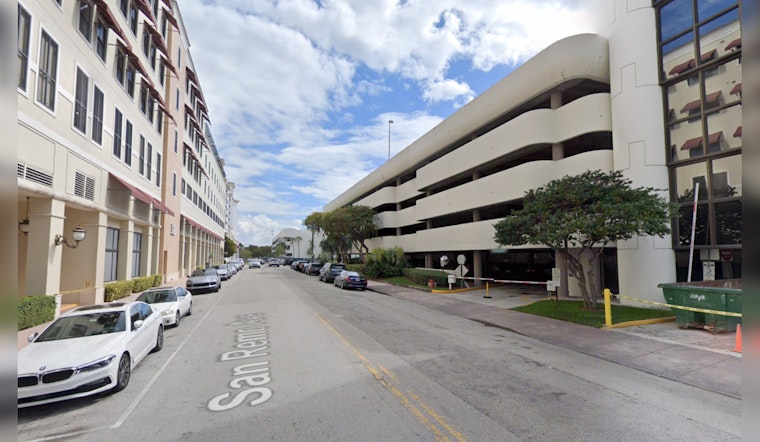 SUV Dangles on Edge of Parking Garage in Coral Gables, Driver Rescued