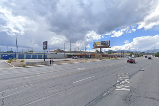 Defensive Tactic Employed as Large Fire Engulfs Kearns Strip Mall, Impacting Traffic Near High School