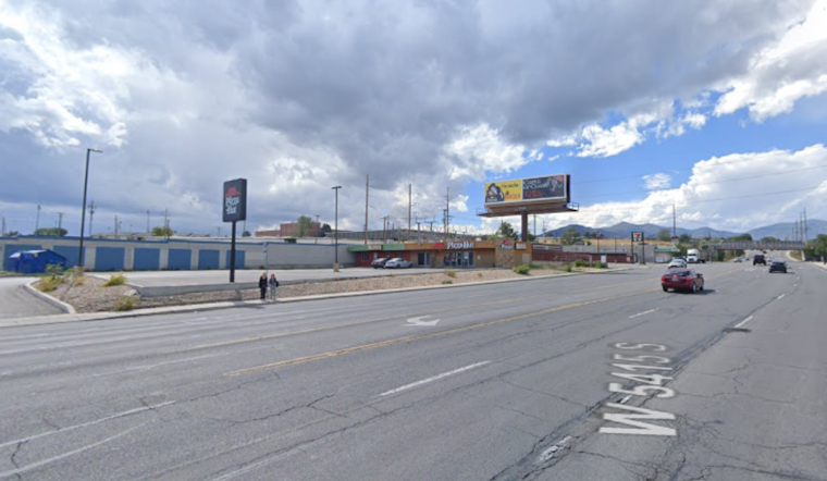 Defensive Tactic Employed as Large Fire Engulfs Kearns Strip Mall, Impacting Traffic Near High School