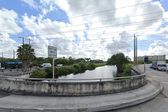 Driver Self-Rescues as Car Plunges into Davie Canal, Traffic Impacted on Orange Drive