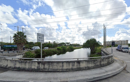 Driver Self-Rescues as Car Plunges into Davie Canal, Traffic Impacted on Orange Drive