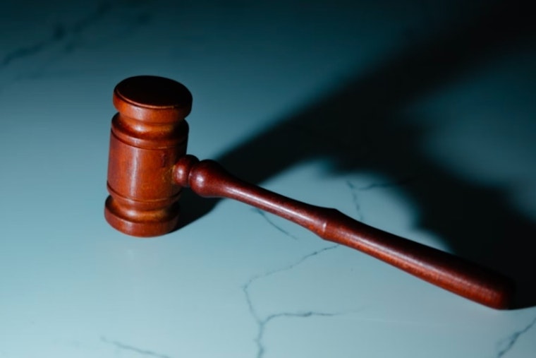 Tampa Man Receives 14-Year Sentence for Illegal Firearm Possession and Breach of Federal Supervised Release