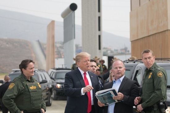 Trump's Executive Blitz: Federal Diversity Programs Axed, Refugee Flights Grounded in Sweeping Policy Overhaul