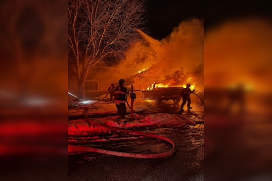 Two Indianapolis Firefighters Injured Battling Blaze at Colleague's Home, Family and Pet Safely Evacuated
