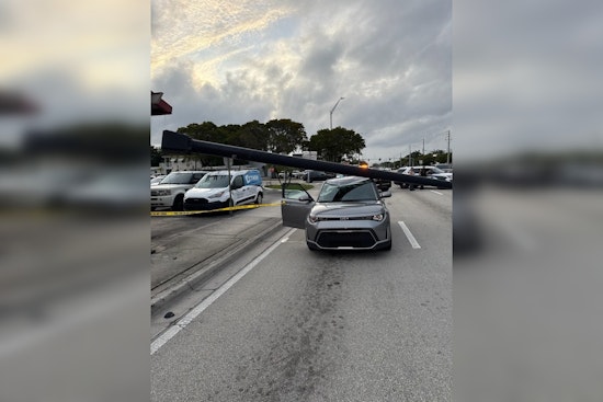Vehicle Collision with Streetlight Disrupts Traffic on East Oakland Park Blvd in Fort Lauderdale