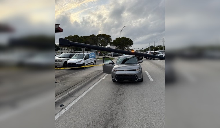 Vehicle Collision with Streetlight Disrupts Traffic on East Oakland Park Blvd in Fort Lauderdale