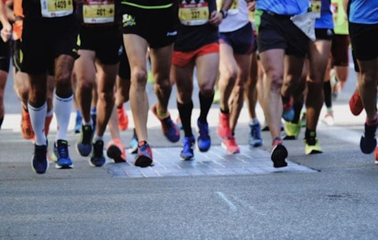 Andrew Bowman, Christina Welsh Win Rain-Soaked Detroit Free Press Marathon