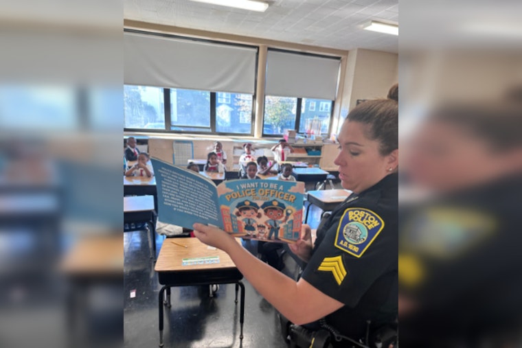 Boston Police Officers Foster Community Ties with Storytime at Sacred Heart STEM School in Roslindale