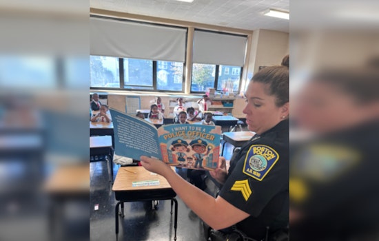 Boston Police Officers Foster Community Ties with Storytime at Sacred Heart STEM School in Roslindale