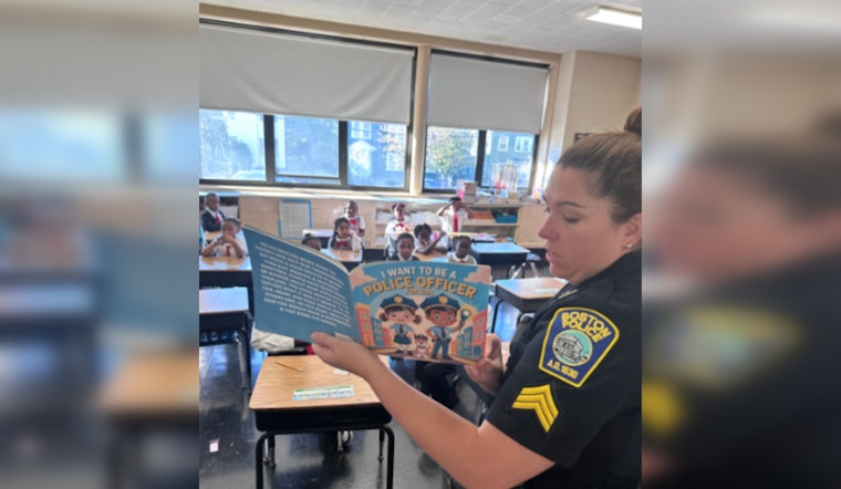 Boston Police Officers Foster Community Ties with Storytime at Sacred Heart STEM School in Roslindale