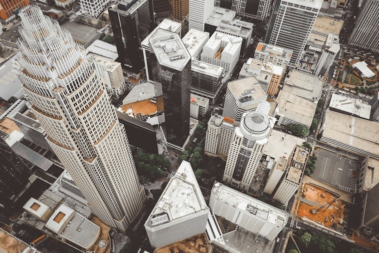 Charlotte Solidifies Position as North Carolina's Largest City Amid Real Estate Boom and University Merger Debates