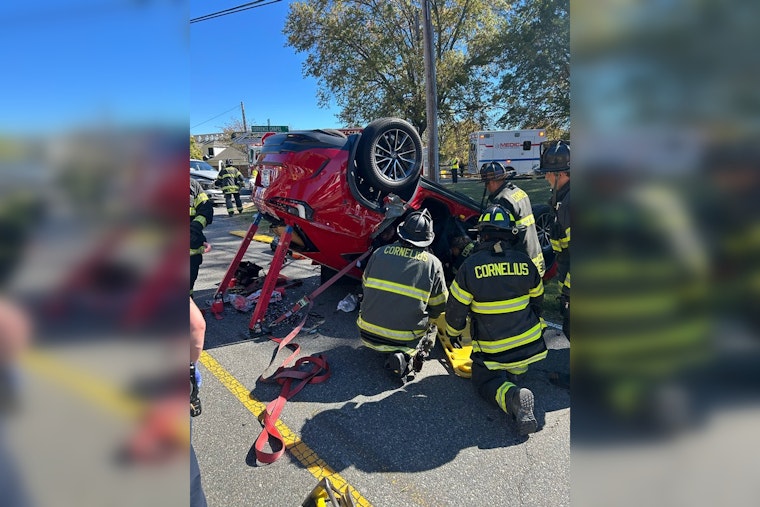 Cornelius Firefighters Swiftly Rescue Two Victims Trapped in Overturned Vehicle Following Collision