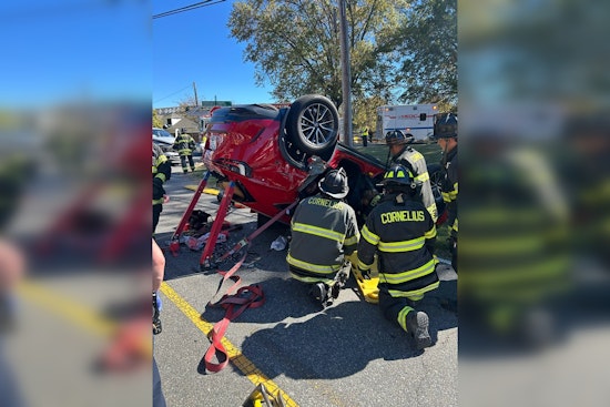 Cornelius Firefighters Swiftly Rescue Two Victims Trapped in Overturned Vehicle Following Collision
