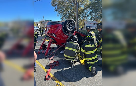 Cornelius Firefighters Swiftly Rescue Two Victims Trapped in Overturned Vehicle Following Collision