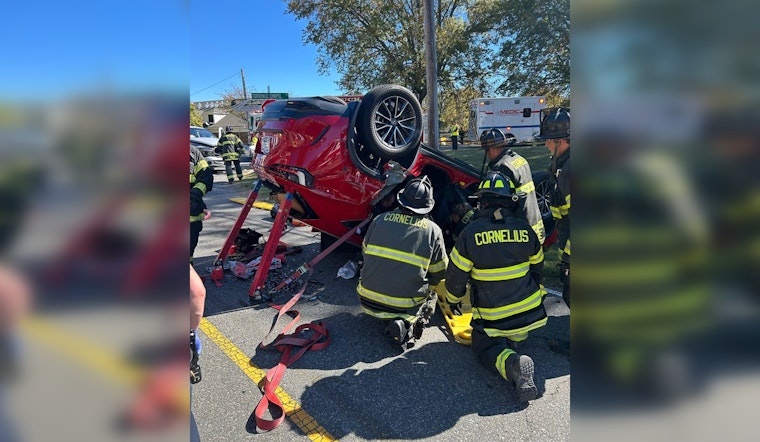 Cornelius Firefighters Swiftly Rescue Two Victims Trapped in Overturned Vehicle Following Collision