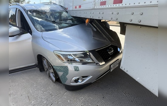 Driver Miraculously Unharmed After Van Becomes Wedged Under 18-Wheeler on I-45 Near The Woodlands
