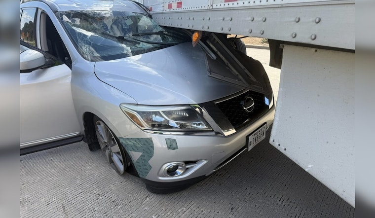 Driver Miraculously Unharmed After Van Becomes Wedged Under 18-Wheeler on I-45 Near The Woodlands