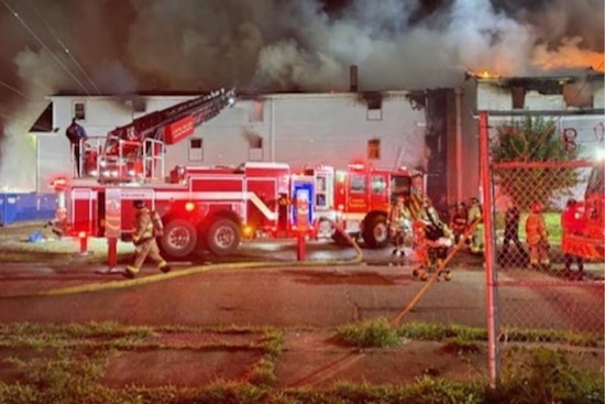 Firefighters Battle Blaze in Canton's Boarded-Up Building, Search for Possible Victims Hampered