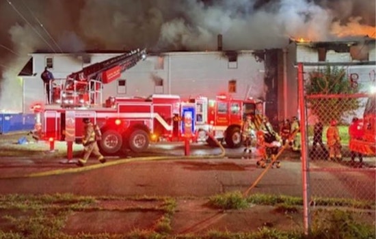 Firefighters Battle Blaze in Canton's Boarded-Up Building, Search for Possible Victims Hampered