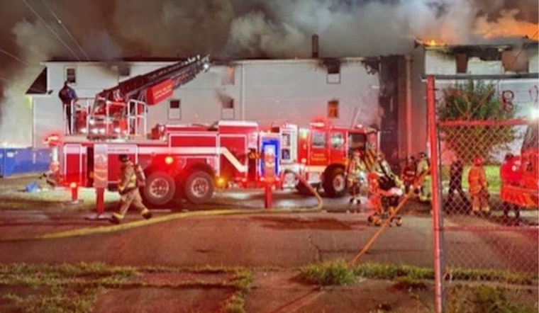 Firefighters Battle Blaze in Canton's Boarded-Up Building, Search for Possible Victims Hampered