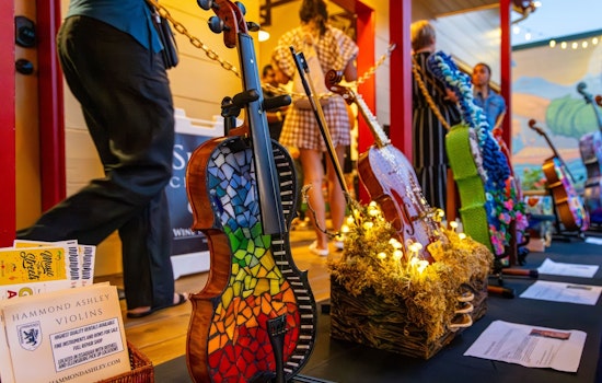 Issaquah's "Strings of Change" Exhibit Transforms Water-Damaged Instruments into Art, Extends Run at Historic Shell Station