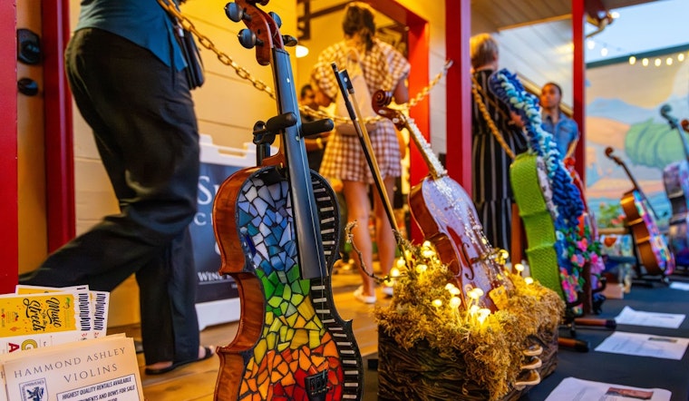 Issaquah's "Strings of Change" Exhibit Transforms Water-Damaged Instruments into Art, Extends Run at Historic Shell Station