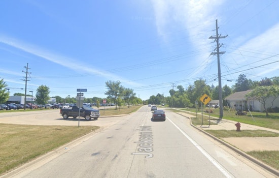 Michigan State Trooper Sustains Minor Injuries in Collision with Car Hauler in Ann Arbor
