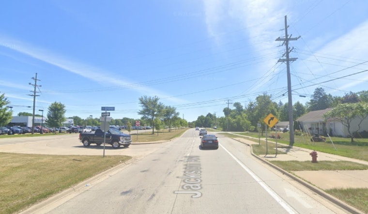 Michigan State Trooper Sustains Minor Injuries in Collision with Car Hauler in Ann Arbor