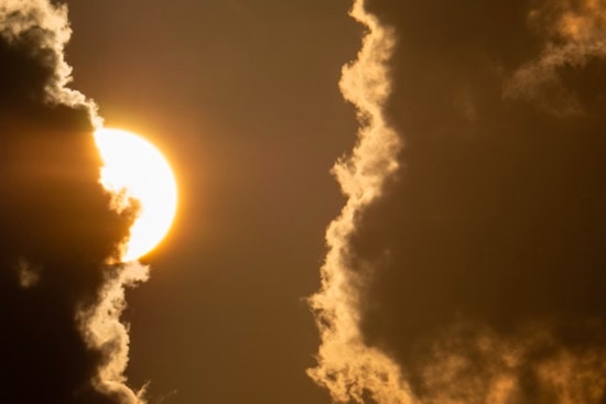 Mixed Weather in Boston Brings Sunny Days and Showers with Tropical Systems Monitored