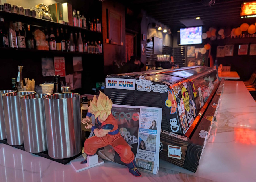 Bar counter with manga artwork