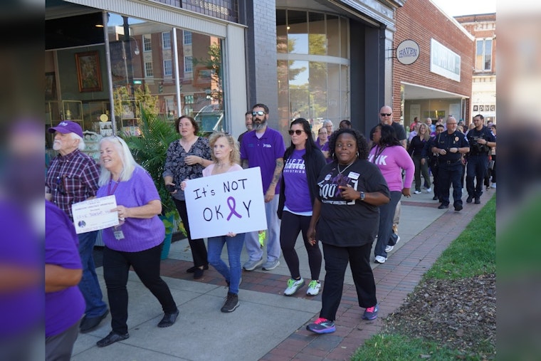 Statesville Community and Officials March in Solidarity During "Walk a Mile in Their Shoes" Event for Domestic Violence Awareness