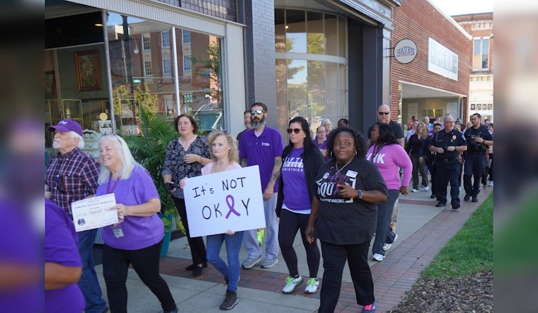 Statesville Community and Officials March in Solidarity During "Walk a Mile in Their Shoes" Event for Domestic Violence Awareness