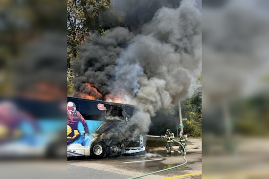 UMass Lowell Marching Band Bus Engulfed in Flames as Students Evacuate Safely in Westwood Emergency